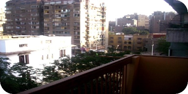 شقة للبيع بالدقي تطل على شارع التحرير